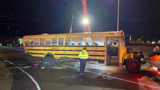 A suspected drunk driver crashed into a school bus in Warsaw, Indiana. (Credit: Warsaw Police Dept.)