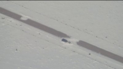Rescatan a 19 personas y un perro que quedaron atrapados en una tormenta de nieve