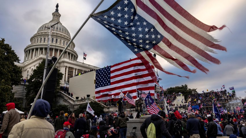 WASHINGTON, DC – JANUARY 6: Pro-Trump protesters gather in front of the U.S. Capitol Building on January 6, 2021 in Washington, DC. Trump supporters gathered in the nation’s capital to protest the ratification of President-elect Joe Biden’s Electoral College victory over President Trump in the 2020 election. A pro-Trump mob later stormed the Capitol, breaking windows and clashing with police officers. Five people died as a result.  (Photo by Brent Stirton/Getty Images)