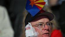 MILWAUKEE, WI - JULY 17: An attendee wears a bandage on his ear in solidarity with former president Donald Trump during Day 3 of the Republican National Convention on July 17, 2024 in Milwaukee, WI. Former President Donald Trump is the Republican presidential candidate and will address the convention on Thursday. (Photo by Ricky Carioti/The Washington Post via Getty Images)