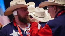 MILWAUKEE, WISCONSIN - JULY 17: A man wearing a cowboy hat has a "bandage" on his ear  on the third day of the Republican National Convention at the Fiserv Forum on July 17, 2024 in Milwaukee, Wisconsin. Delegates, politicians, and the Republican faithful are in Milwaukee for the annual convention, concluding with former President Donald Trump accepting his party's presidential nomination. The RNC takes place from July 15-18.  (Photo by Andrew Harnik/Getty Images)
