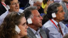 MILWAUKEE, WISCONSIN - JULY 17: People wear "bandages" on their ears as they watch on the third day of the Republican National Convention at the Fiserv Forum on July 17, 2024 in Milwaukee, Wisconsin. Delegates, politicians, and the Republican faithful are in Milwaukee for the annual convention, concluding with former President Donald Trump accepting his party's presidential nomination. The RNC takes place from July 15-18. (Photo by Joe Raedle/Getty Images)