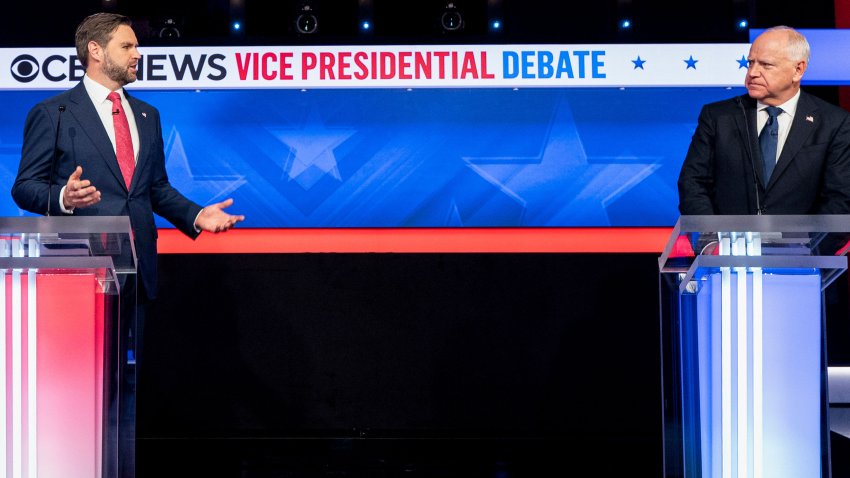 Senator JD Vance, a Republican from Ohio and Republican vice-presidential nominee, left, and Tim Walz, governor of Minnesota and Democratic vice-presidential nominee, during the first vice presidential debate at the CBS Broadcast Center in New York, US, on Tuesday, Oct. 1, 2024. Historically, debates between the running mates of the major party nominees for president have a negligible effect on the contest for the White House, but with the race between Republican Donald Trump and Democrat Kamala Harris being so close, any boost for either ticket could make all the difference. Photographer: Al Drago/Bloomberg via Getty Images