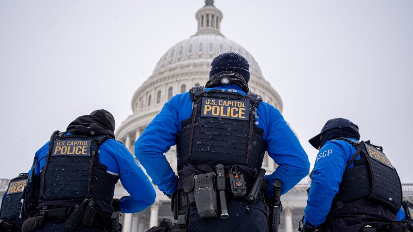 WASHINGTON, DC – JANUARY 6: The Dome of the U.S. Capitol Building is visible as U.S. Capitol Police officers stand guard in a winter storm in the nation’s capital on January 6, 2025 in Washington, DC. Congress is scheduled to certify the 2024 presidential elections results on Monday, four years after a mob of supporters of then-President Donald Trump stormed the Capitol to halt the certification of the 2020 election results. (Photo by Andrew Harnik/Getty Images)