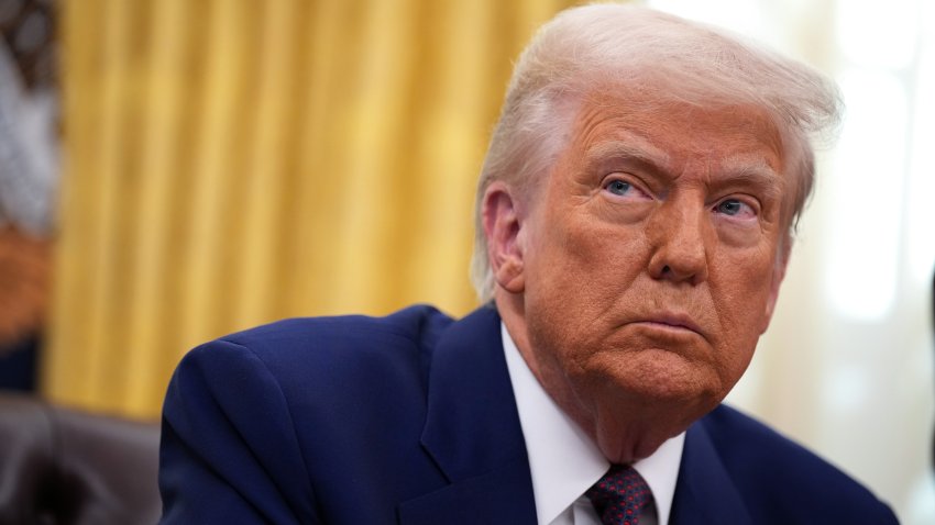 File.  U.S. President Donald Trump delivers remarks after signing an executive order on reciprocal tariffs in the Oval Office at the White House on February 13, 2025 in Washington, DC. Trump announced his plan to increase U.S. tariffs to match the rates other nations charge to import American goods.