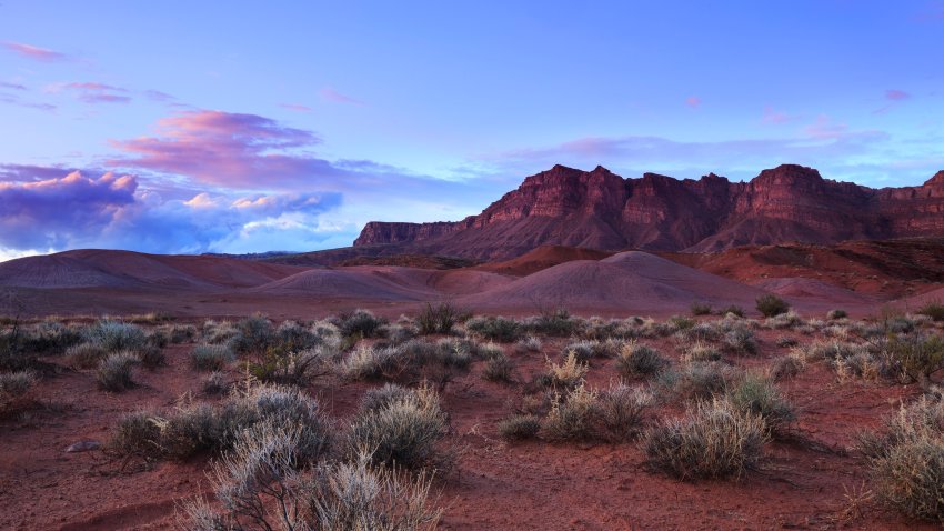 Wide angle desert sunset at the scenic red landscape of Fort Pierce, near St George, Utah, USA.