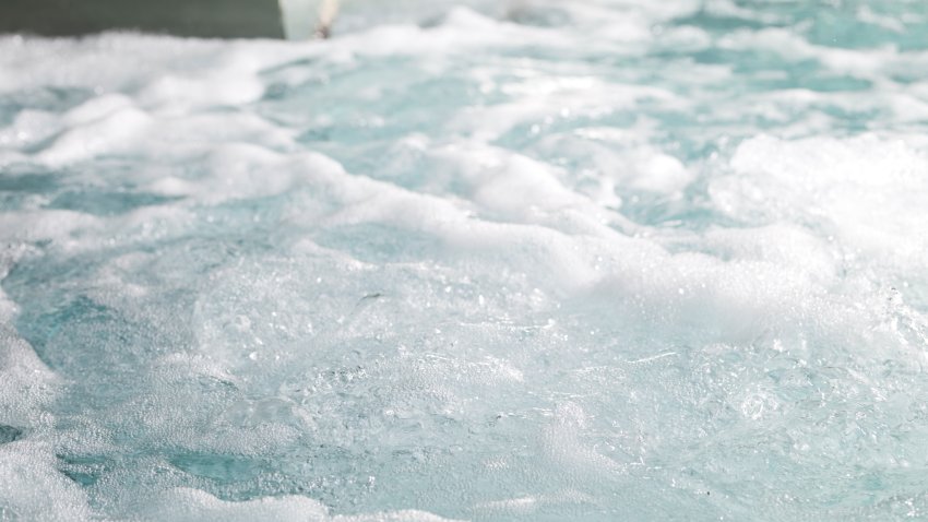 Hot tub close up, white bubbles in movement.