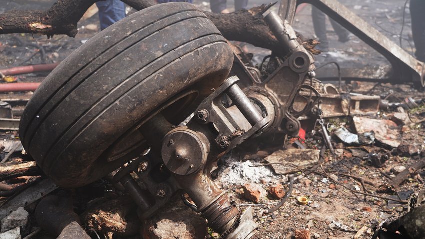 Aircraft wheel gear amongst debris at the crash site of Air India Ltd. flight AI171 in Ahmedabad, Gujarat, India, on Thursday, June 12, 2025. An Air India Boeing 787 Dreamliner traveling from Ahmedabad to London’s Gatwick airport crashed shortly after taking off, in what stands to be the most serious accident involving the US planemaker’s most advanced widebody airliner. Photographer: Siddharaj Solanki/Bloomberg via Getty Images