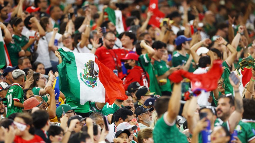 June 24, 2026; Monterrey, Mexico; Mexico fans in the stands celebrate after Julian Quinones scores their second goal in their match against Czech Republic.  Mandatory Credit: Daniel Becerril-Reuters via Imagn Images